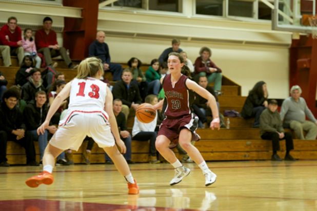 Molly Bent plays in a basketball game for Tabor Academy.