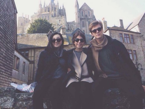 (From Left to Right) Emma Childs, Jenny Griffin, and Ben Falacci pose for a photo in Mont Saint-Michel, France. 