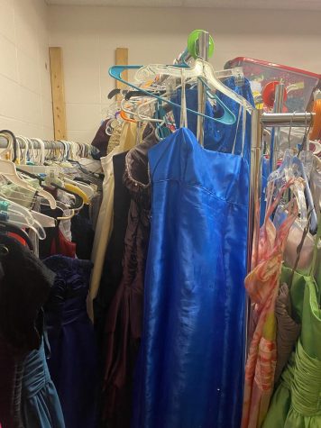 Prom dresses hanging in a closet down at Hub 4. 