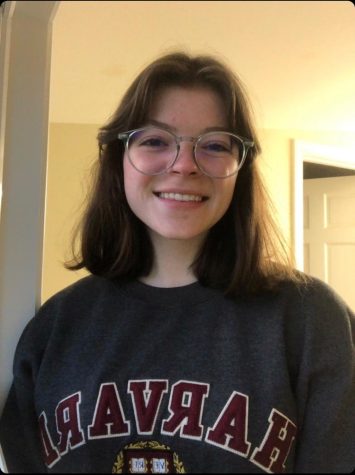 Nora Penni wears a Harvard sweatshirt 